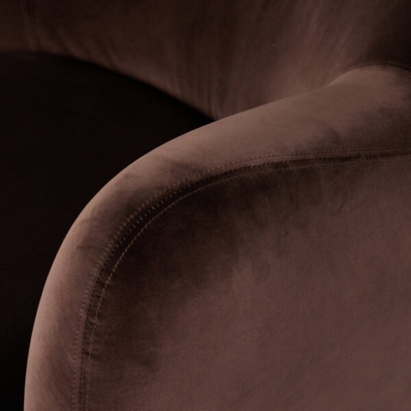 dark brown velvet fabric texture close up on accent chair