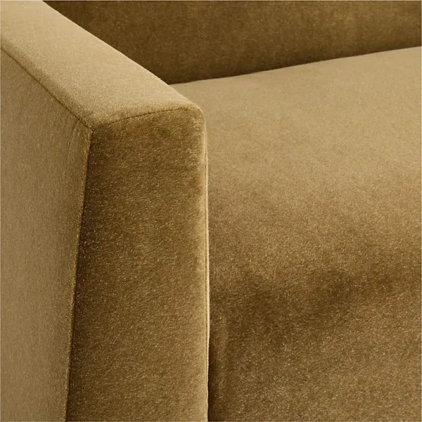 Close up of mustard velvet upholstery texture on INTERIORZE sofa