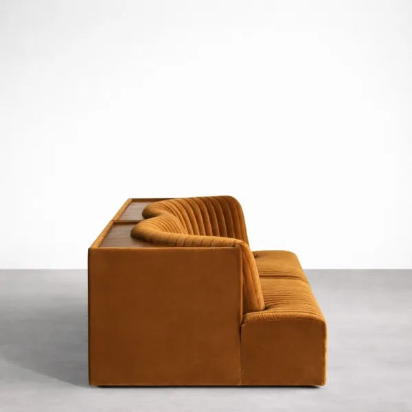 Teakwood velvet sofa side view in caramel brown with channel tufted seat and back