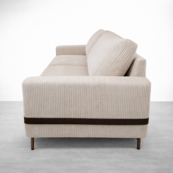 Side view of ivory corduroy 3 seater sofa showing ribbed fabric texture