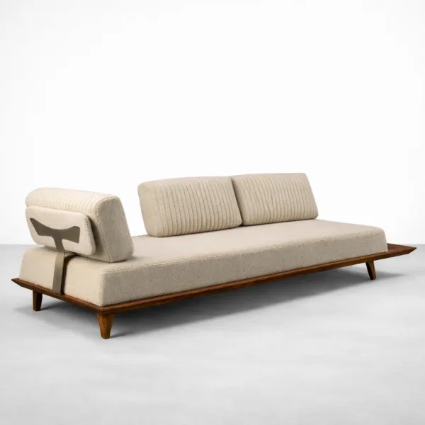 Ivory bouclé daybed sofa with teakwood base and teakwood legs by INTERIORZE angled view