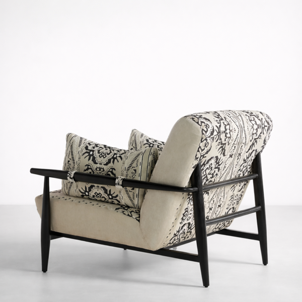 Back side view of teakwood accent chair with cushions