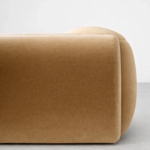 Mustard lounge sofa corner detail showing smooth upholstery finish by INTERIORZE