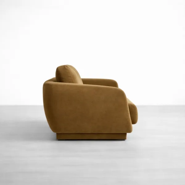 Side view of teakwood brown sofa showing low profile base and rounded arm design