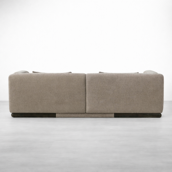 Back view of beige linen sofa with teakwood base by Interiorze