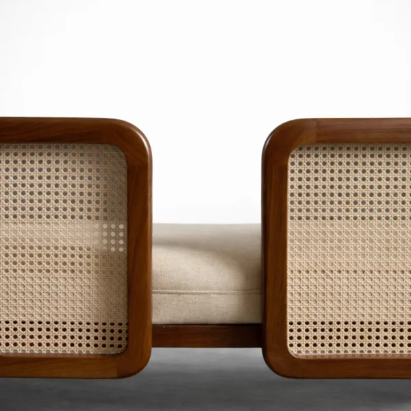 Close-up of handwoven cane panel on teakwood frame daybed sofa by INTERIORZE