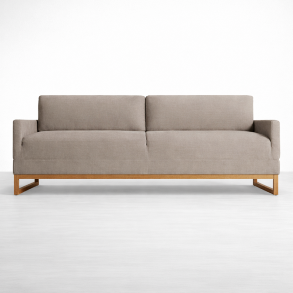 Front view of teakwood sofa in grey fabric upholstery by INTERIORZE
