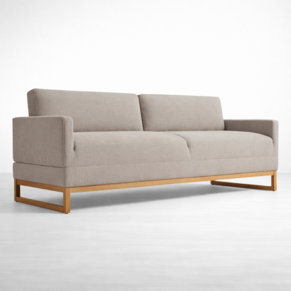 Grey teakwood sofa with wooden base frame and clean modern lines by INTERIORZE