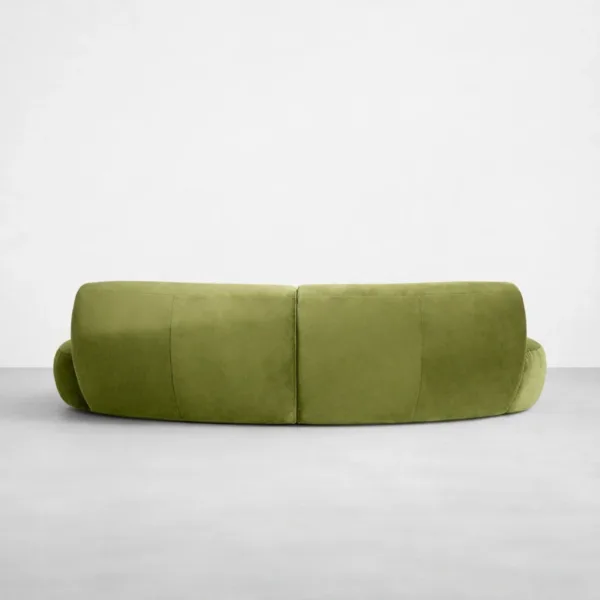 Back view of INTERIORZE Nysa olive green curved 3 seater sofa with two connected modules