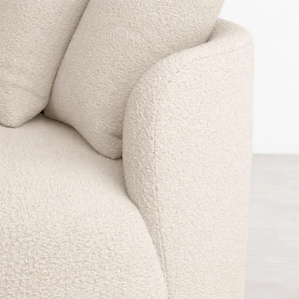 Close up of ivory boucle fabric texture on INTERIORZE sofa