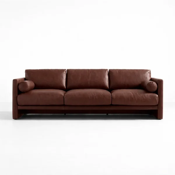Front view of brown leather sofa with teakwood frame by INTERIORZE