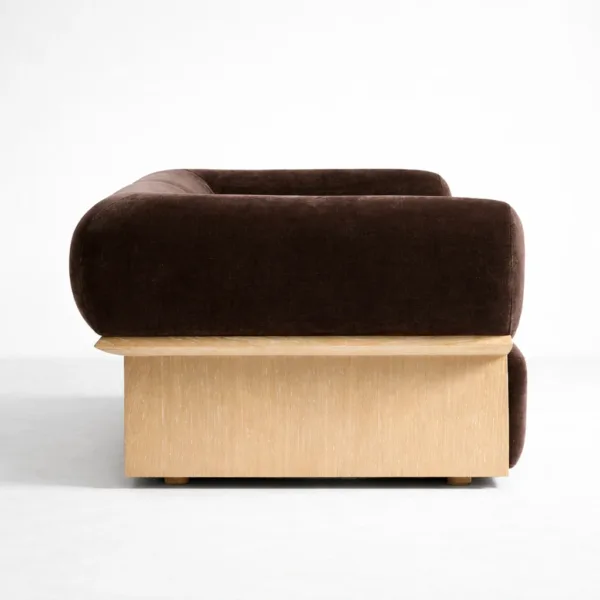 Side view of mocha velvet sofa showing ash wood base by INTERIORZE