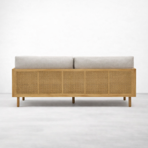 Back view of teakwood rattan sofa showing rattan panel detailing by INTERIORZE