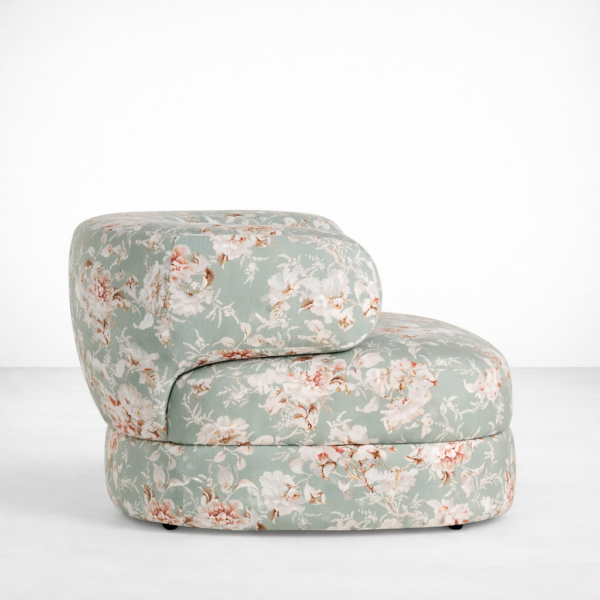 Side view of INTERIORZE sage green floral round accent chair with low back
