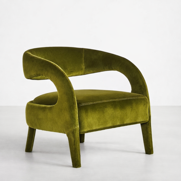 Angled front view of olive green velvet lounge chair with open sides and slim legs