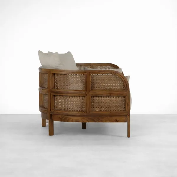Side view of teakwood rattan daybed sofa showing cane panel construction by INTERIORZE