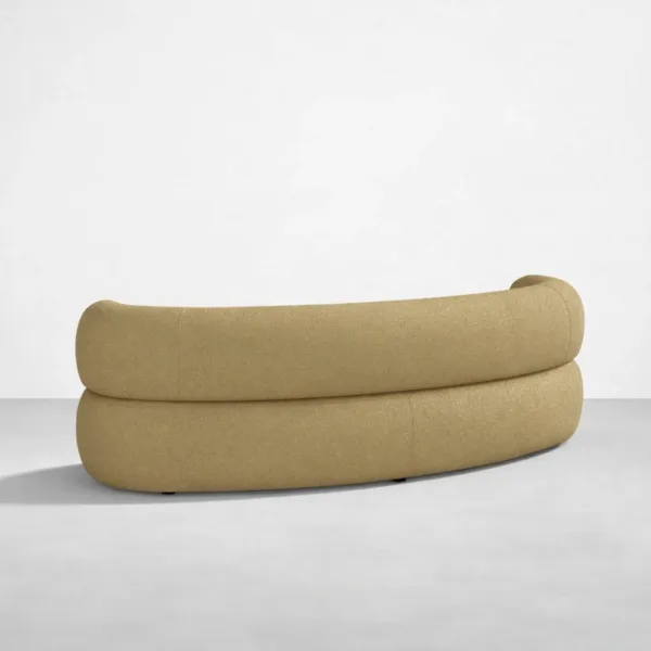 Back view of INTERIORZE Amaira curved beige 3 seater sofa with sculptural kidney shape