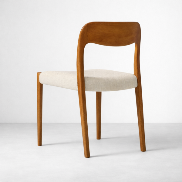 Back view of Elora teakwood dining chair with curved backrest