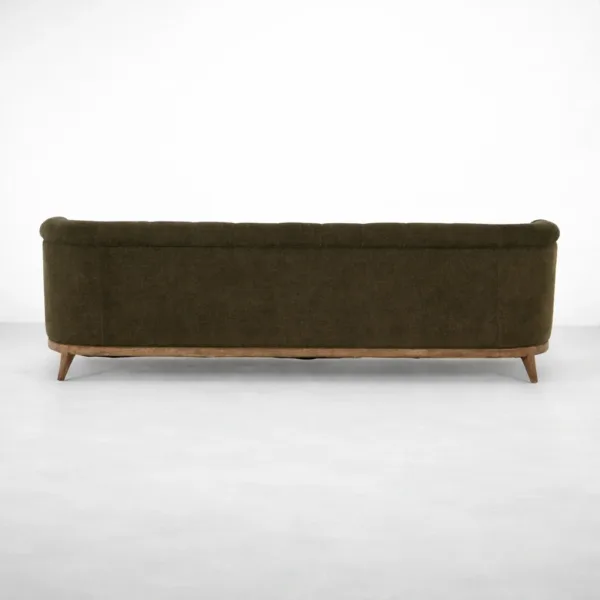 Olive tufted sofa back view showing teakwood frame by INTERIORZE