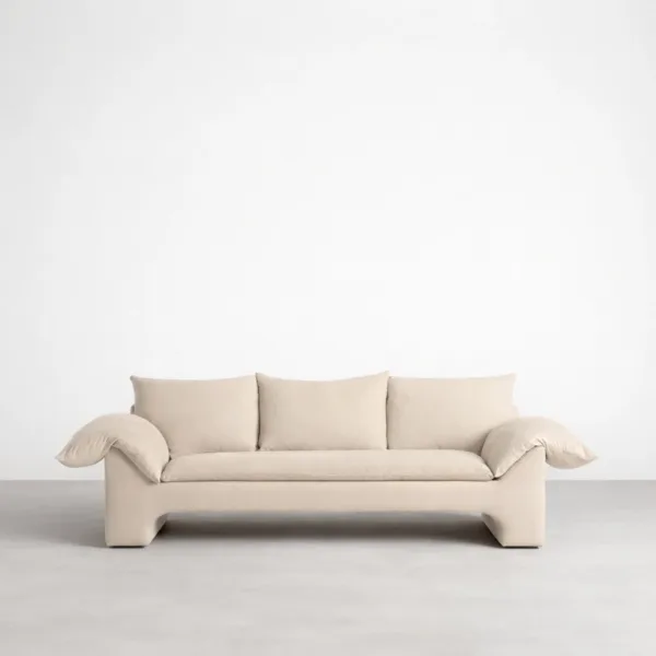 Front view of teakwood cream sofa with cloud arms and three back cushions
