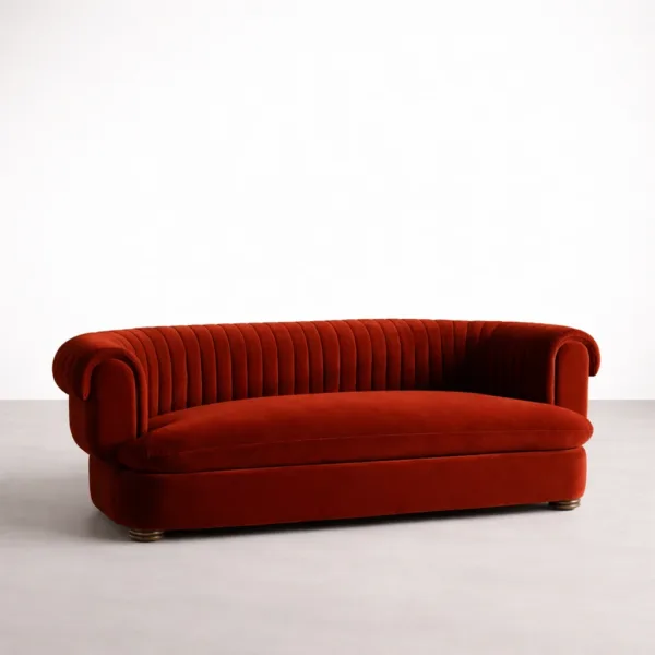 Red velvet sofa with channel tufting and rolled arms front angle view