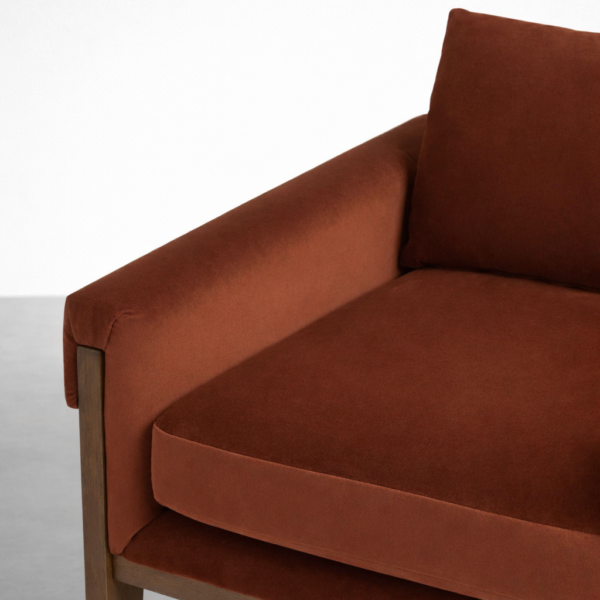teak wood upholstered lounge chair upholstery detail rust velvet