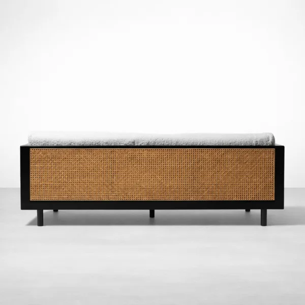 Back view of INTERIORZE Vihaan teak wood cane 3 seater sofa with full natural cane panel framed in black teak