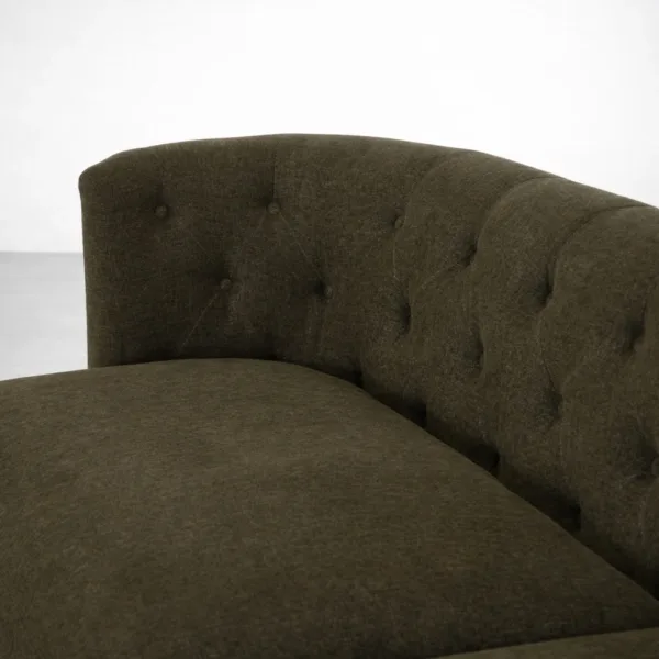 Close up of button tufting on olive tufted sofa upholstery by INTERIORZE