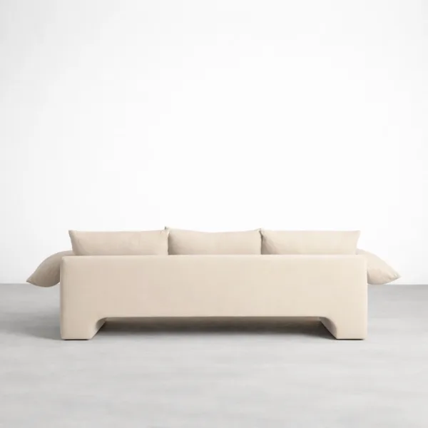 Back view of teakwood cream sofa showing clean upholstered back and low profile