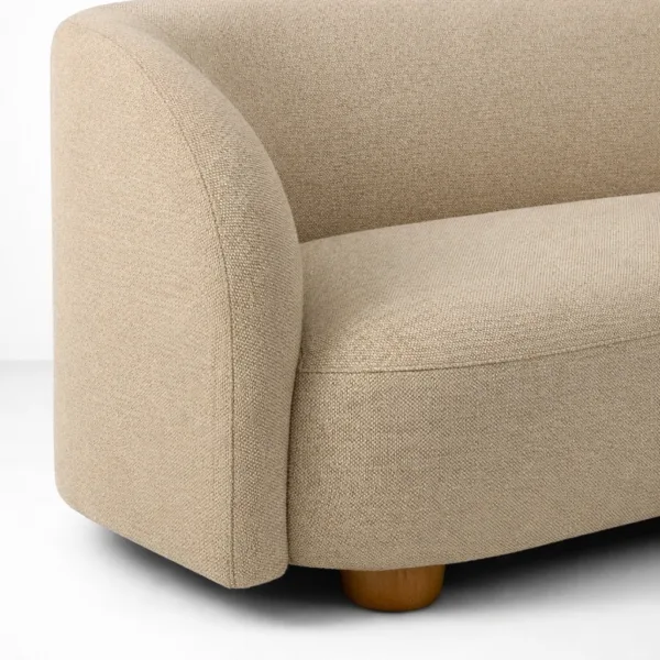 Close-up of beige fabric upholstery on the INTERIORZE Luna sofa