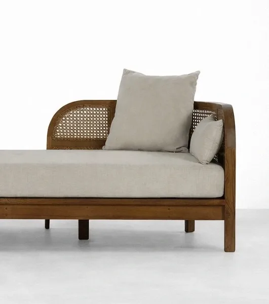 Teakwood rattan daybed sofa with cane arm panel and beige upholstery by INTERIORZ