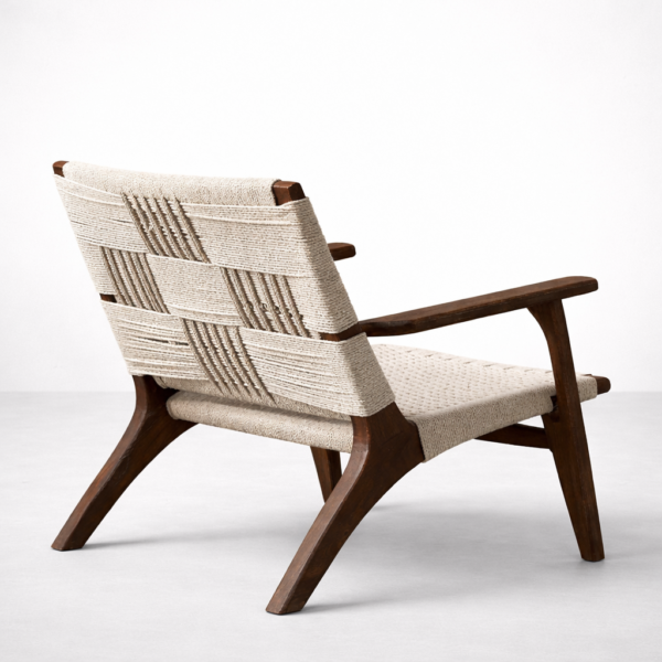 Back view of woven wooden lounge chair showing handwoven rope pattern