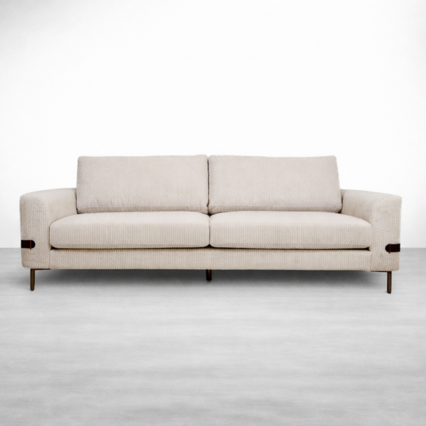 Ivory boucle upholstery with sculptural curves and accent cushions