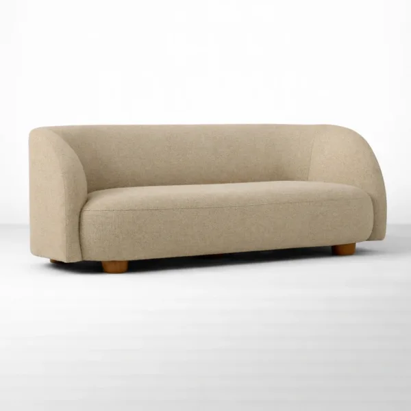 Beige upholstered sofa with curved arms and hardwood frame by INTERIORZE