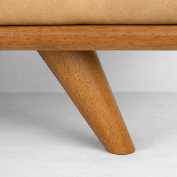 Wooden leg detail of mid-century tan leather 3 seater sofa