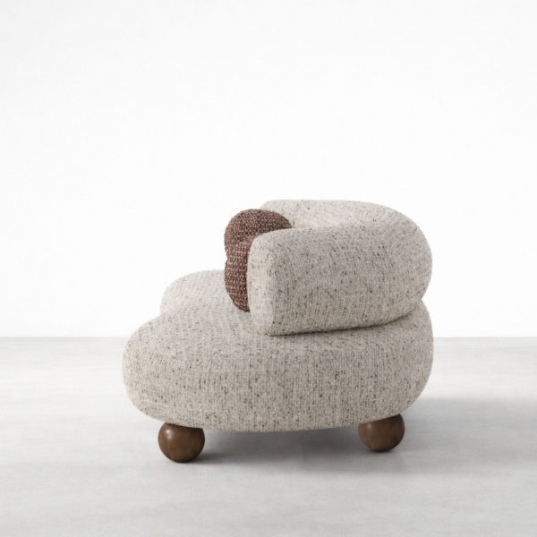 End view of curved boucle 3 seater sofa in ivory by INTERIORZE