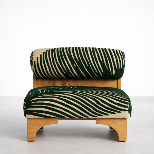 Front view of teakwood lounge chair with green zebra print seat and back