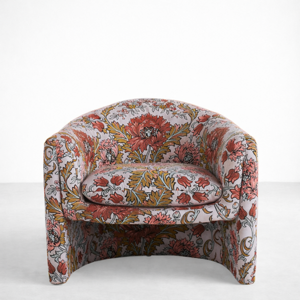 Floral swivel chair front view with cushioned seat and wraparound backrest