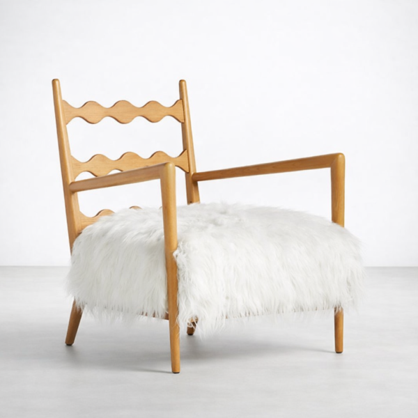 Angled view of ash wood faux fur lounge chair with natural ash frame and white faux fur seat