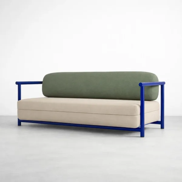 Blue frame lounge sofa side angle view with beige seat cushion and olive backrest by INTERIORZE