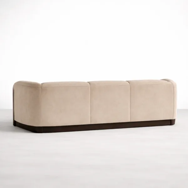 Beige velvet sofa rear view showing teakwood base INTERIORZE Teakcrest