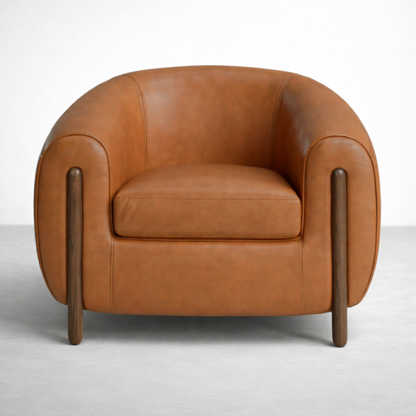 tan leather armchair with teakwood legs front view