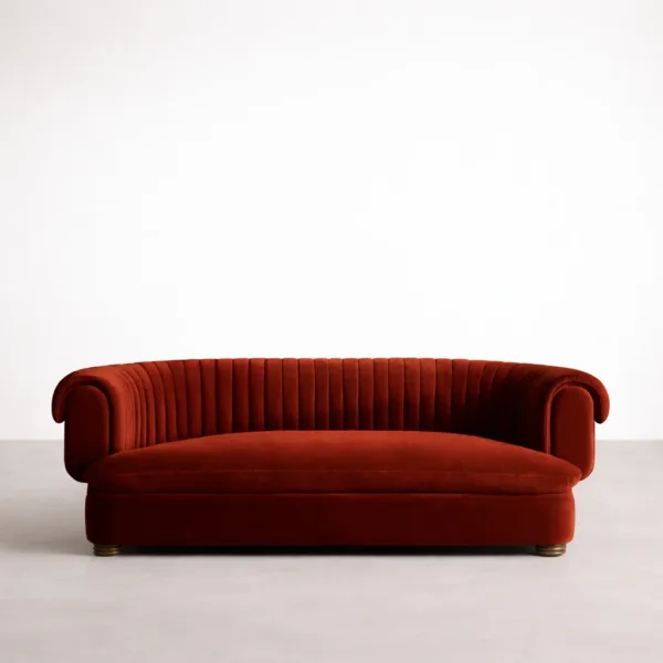 Front view of red velvet sofa with channel tufted back and plush seat cushion