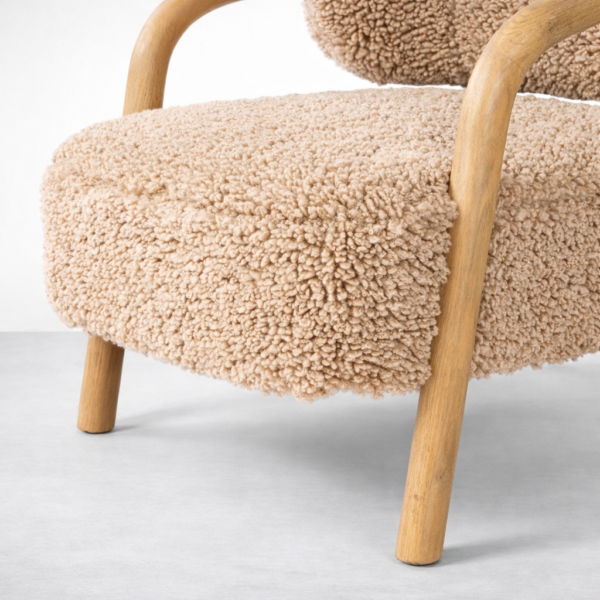 beige boucle fabric texture close up on accent chair