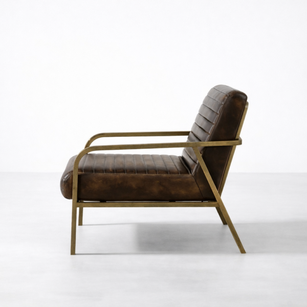 Side profile of brown leather lounge chair with brass-toned metal frame