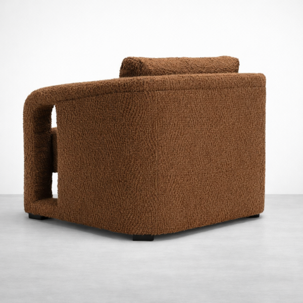 Brown Boucle Armchair by INTERIORZE photographed from rear angle showing rounded back