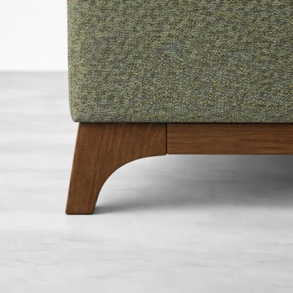 Teakwood base close-up on olive green 3 seater sofa INTERIORZE Arbour