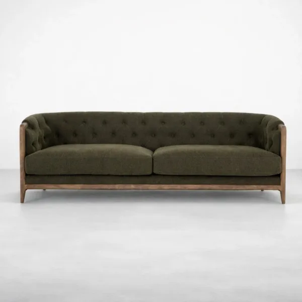 Olive tufted sofa front view with teakwood frame and button tufting by INTERIORZE
