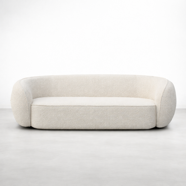 Front view of cream boucle curved sofa with rounded arms by INTERIORZE