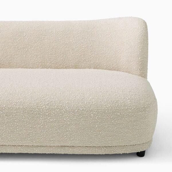 Close-up of ivory boucle fabric on INTERIORZE Lune curved back sofa